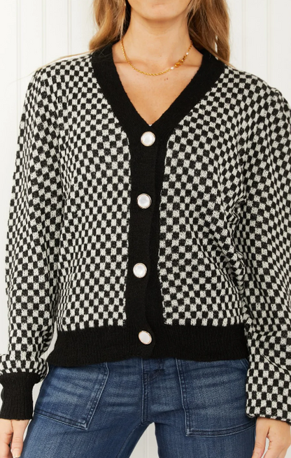 WJ Look the Part Large check puff shoulder cardigan.